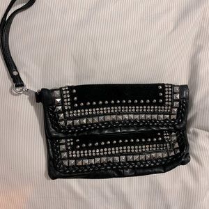 Black leather and suede embellished wristlet from Bebe!